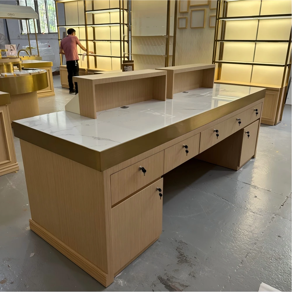 Wide view of cashier counter and tall cabinet row on the workshop floor in a retail store design pre-shipment set