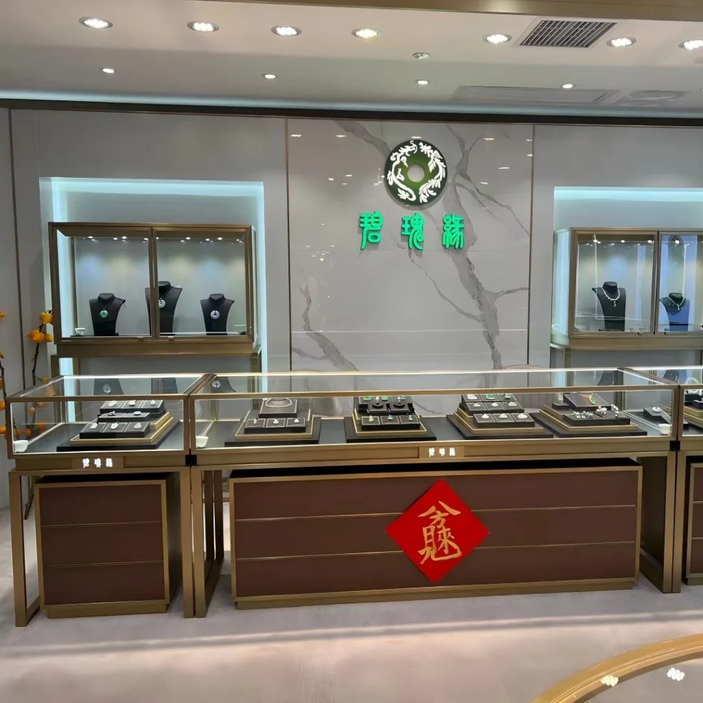 Illuminated wall cabinets for carved jade pieces in a specialty gemstone store fit-out