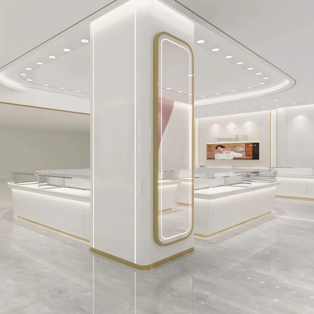 Jewelry retail display cases in white and champagne: curved island counters circling a lit column anchor under a blush gradient ceiling