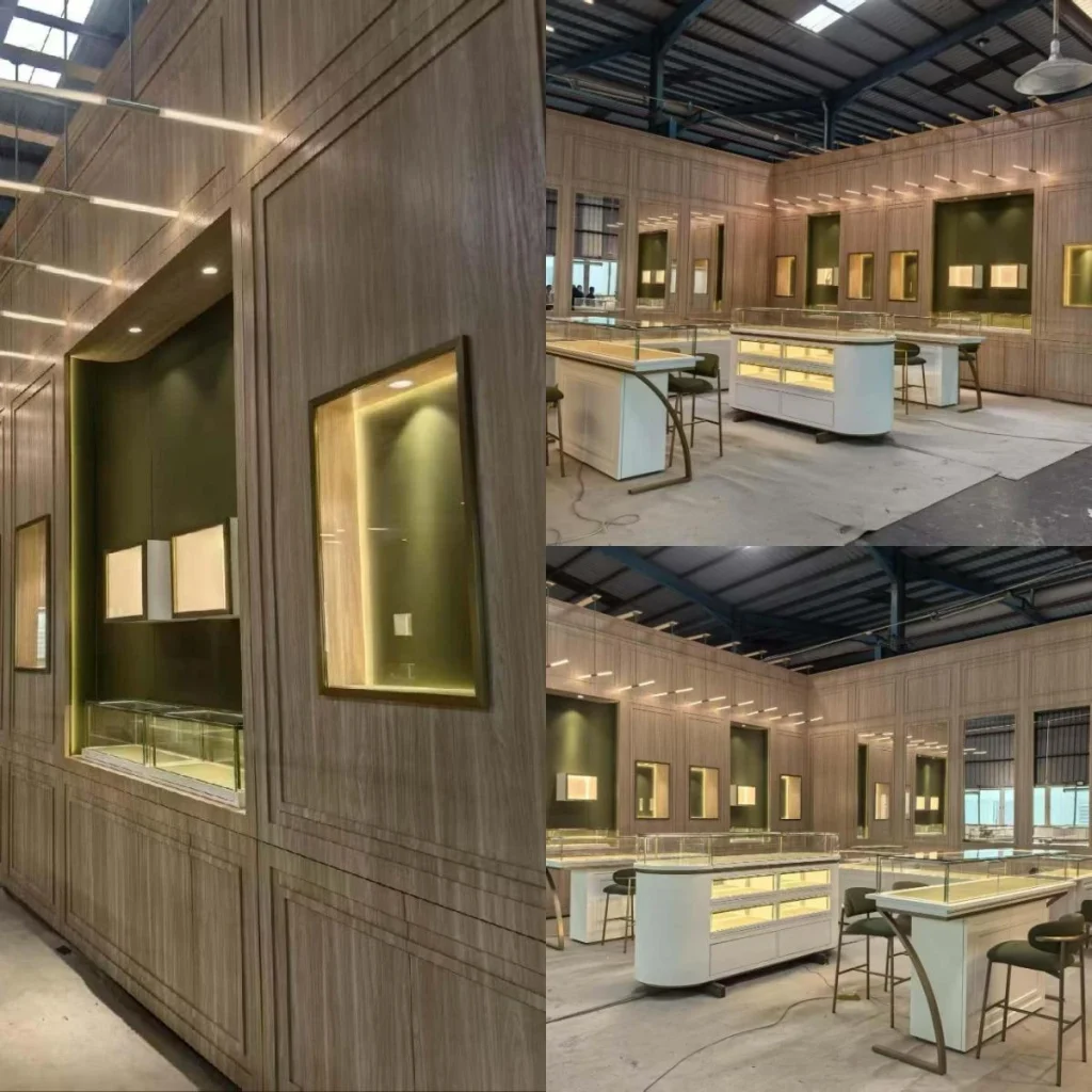 Modular jewelry showroom with paneled display niche walls, curved island counters and consultation seating