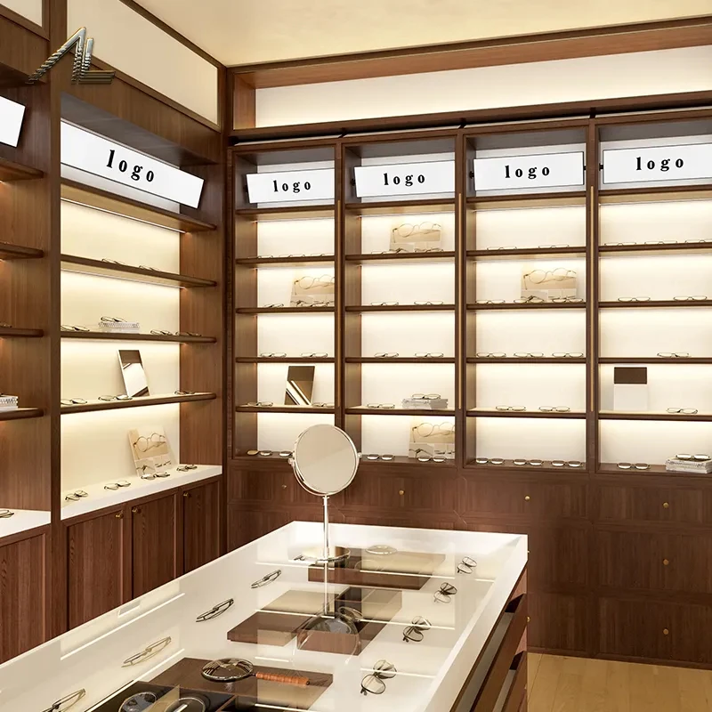 Five eyeglasses display case towers with lit shelves and a low island under a warm-lit ceiling in a China boutique