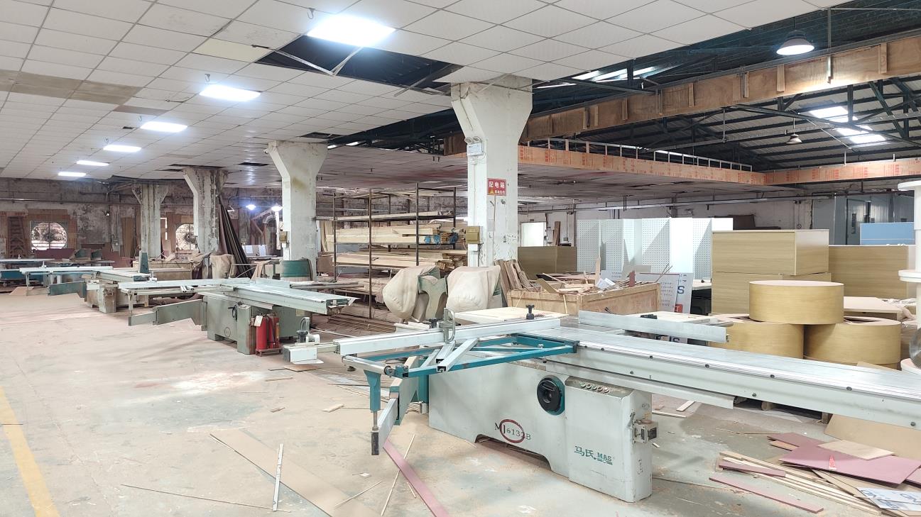 CNC cutting machine cutting display case panels