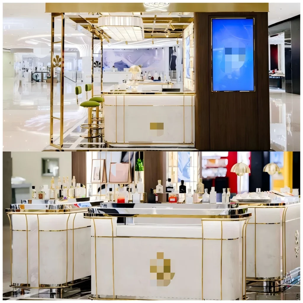 Curved marble perfume counter with gold-framed niches, shell-shaped accent lamps and green velvet stools in a mall fragrance boutique