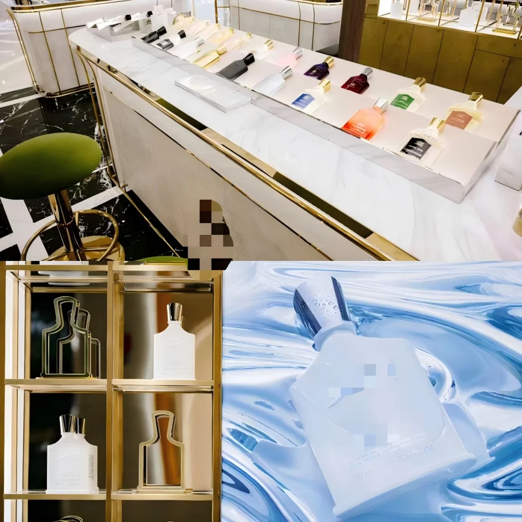 Perfume display case details: gold-framed glass niches, backlit bottle-silhouette panels and tester staging on a marble counter