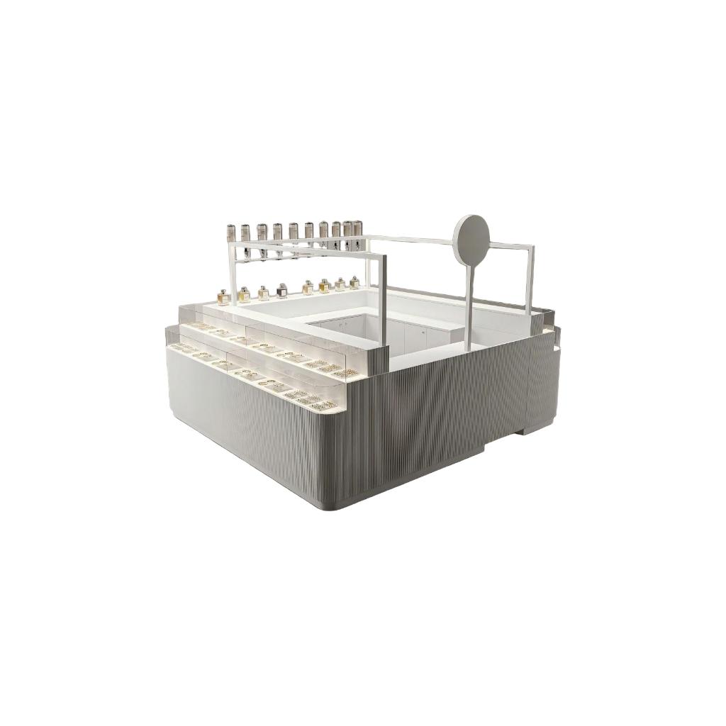 all-white fluted perfume kiosk for sale on white background, stepped glass showcases and raised bottle frame with a round logo sign