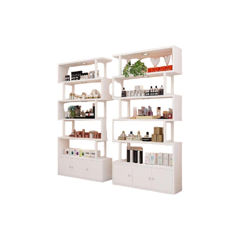 Tiered display shelf DS-33 in white, a staggered box-style open display shelving column with recessed spotlights and a lower storage cabinet, on a white background